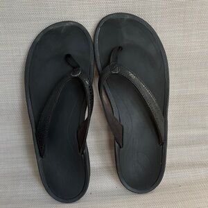 Women’s OluKai Black Flip Flops